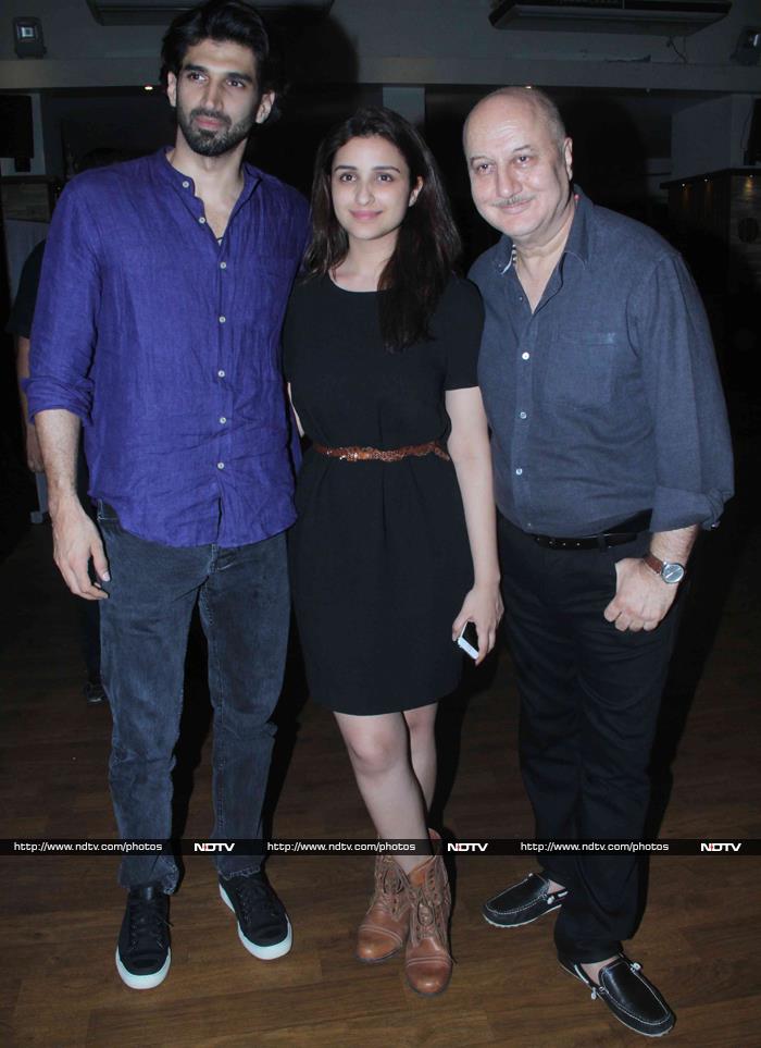 Actors Parineeti Chopra and Aditya Roy Kapur, who've worked with Mr Kher in <i>Daawat-e-Ishq</i>, were all smiles as they posed with the man of the hour.