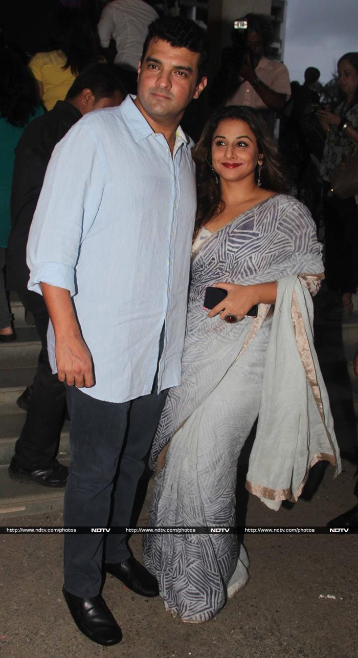 Vidya Balan, who looked gorgeous in a white <i>sari</i>, posed with her producer-husband Siddharth Roy Kapur.