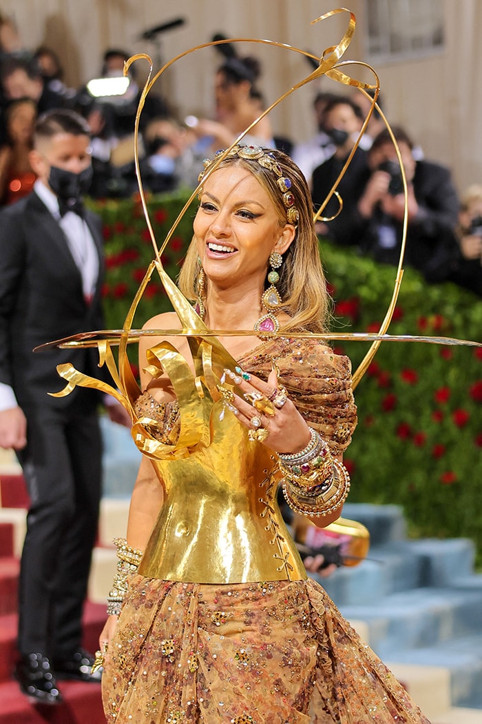 Natasha Poonawalla greeted the cameras at the Met Gala with a bright smile.