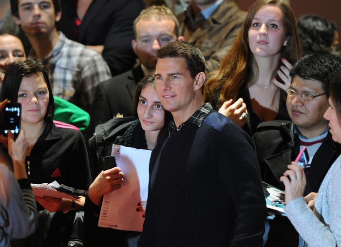 Tom Cruise poses for photographers at the London premiere of the latest film in the <i>Mission: Impossible</i> series, <i>Mission: Impossible - Ghost Protocol</i>.