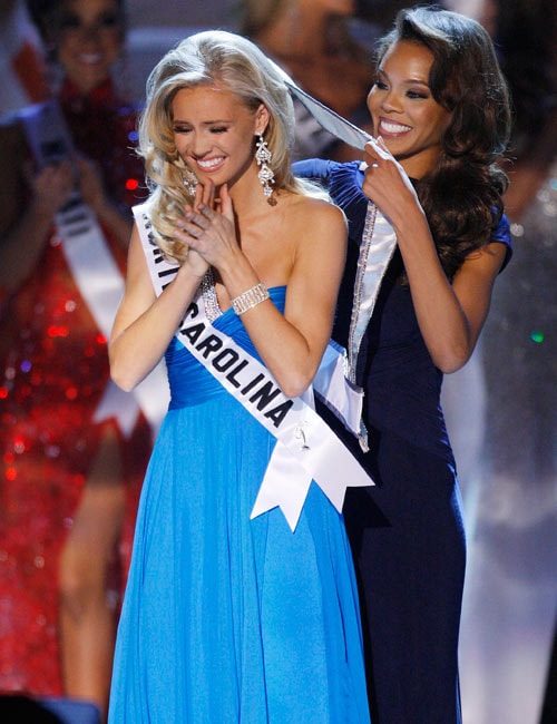 Miss North Carolina Kristen Dalton, reacts after being announced Miss USA and is crowned by the 2008 Miss USA Crystle Stewart.