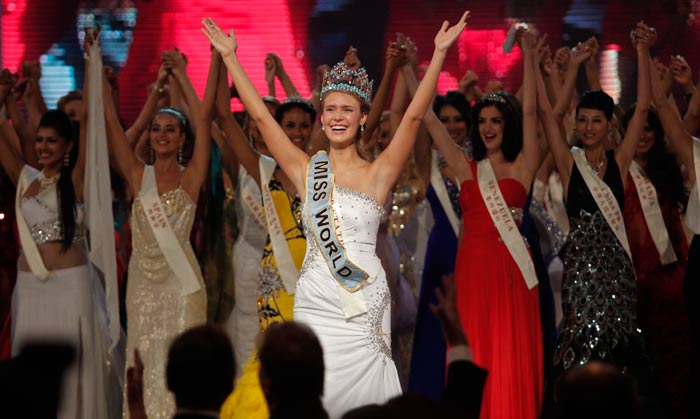 On top of the world: Alexandria gestures moments after being crowned. (Photo: AP)