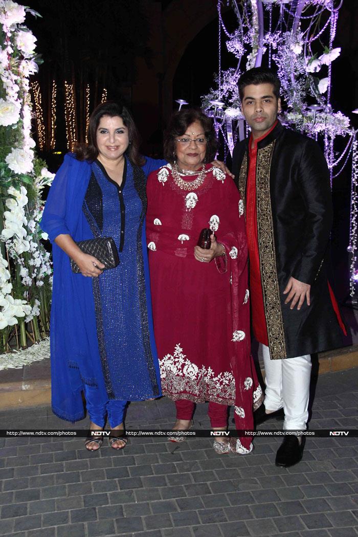 Filmmaker Karan Johar posed for a photograph with his mother Hiroo and filmmaker Farah Khan.