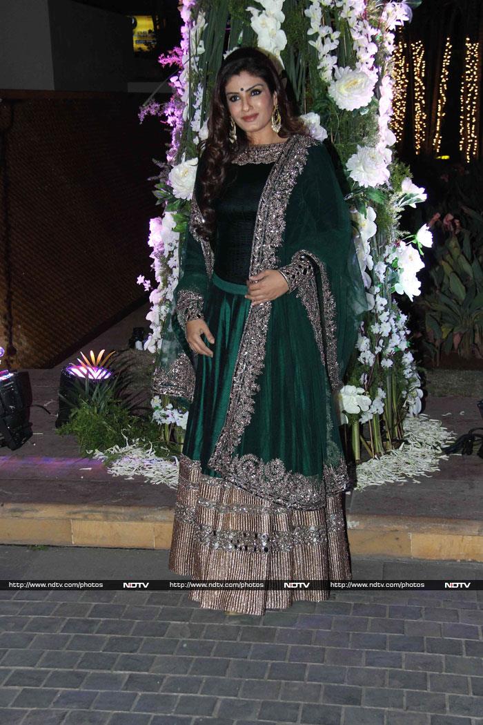 Actress Raveena Tandon looked pretty in a bottle green Manish Malhotra <i>lehenga</i> worn with a full-sleeved choli.