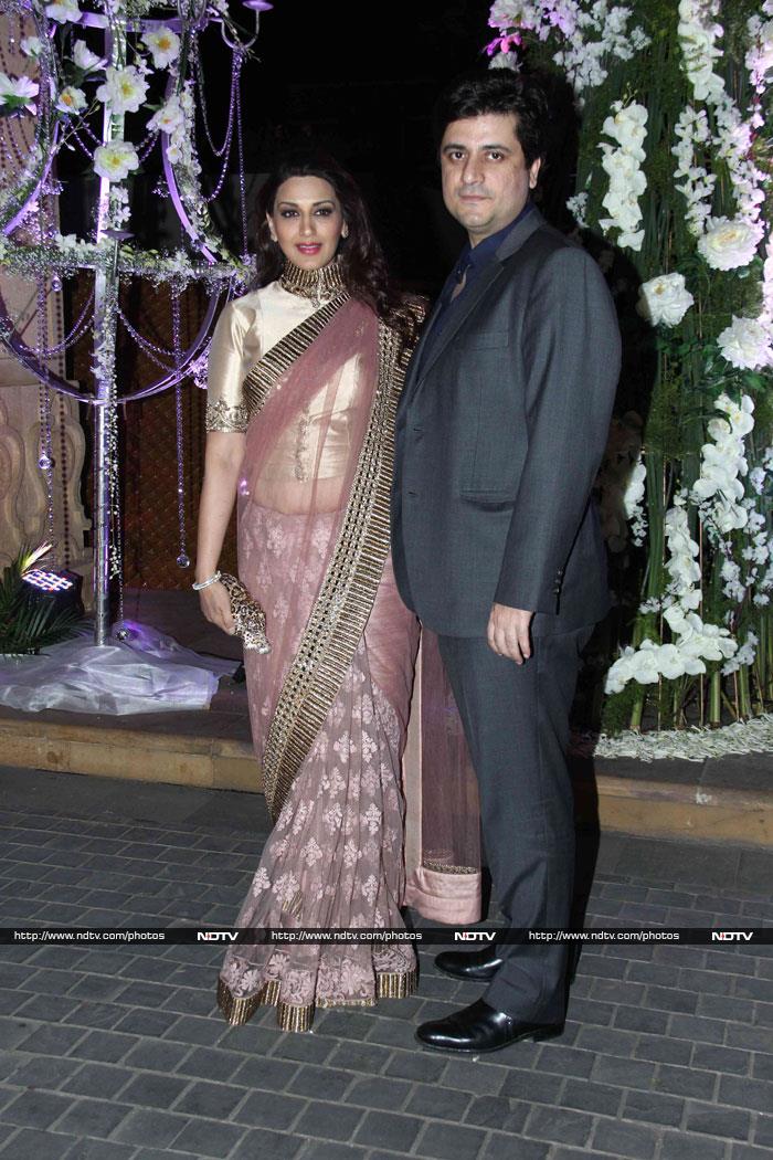 Sonali Bendre, who came with husband Goldie Behl, looked elegant in a pink sari worn with a shimmery blouse.