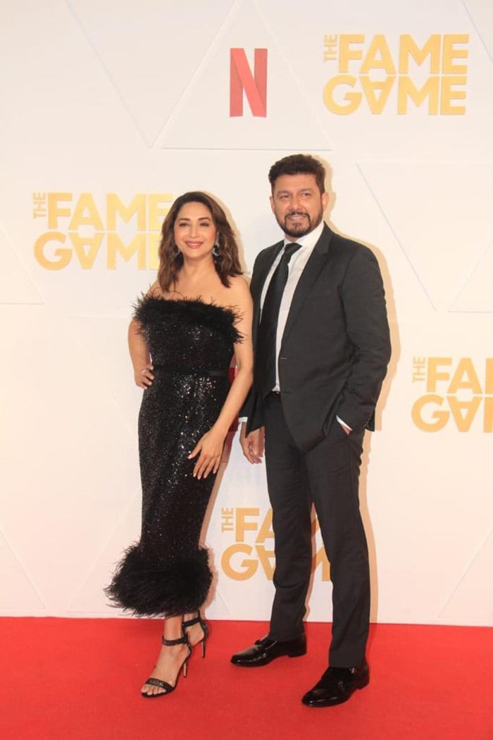 Madhuri Dixit looked stunning in a black dress at the screening of The Fame Game. Sriram Nene accompanied her