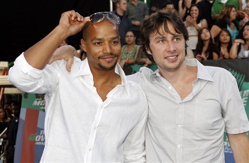 Actors Donald Faison, left, and Zach Braff arrive for the 2006 MTV Movie Awards in Culver City.