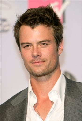 Josh Duhamel poses in the press room during the MTV Movie Awards in Los Angeles.
