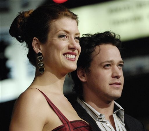 Grey's Anatomy cast members Kate Walsh, left, and T.R. Knight pose together at the premiere of the film