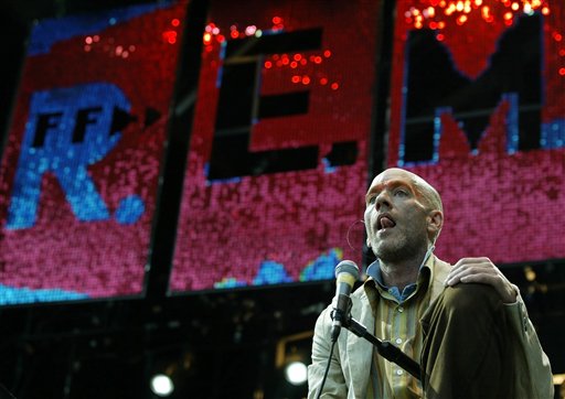 The singer of the US band R.E.M. Michael Stipe sings during their concert in Hamburg's Volkspark, northern Germany. The four original members of R.E.M. gave a rare performanceas the group was inducted into the Georgia Music Hall of Fame.