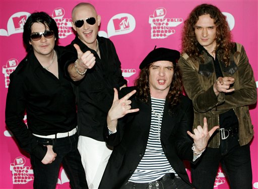 Members of the band The Darkness, from left, Ed Graham, Richie Edwards, Justin Hawkins, and Dan Hawkins arrive for the MTV Australia Music Video Awards in Sydney, Australia.