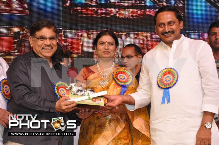 Renowned film producer Allu Aravind collects his award for <i>Magadheera</i>, which won the award for Most Popular Film of 2009.