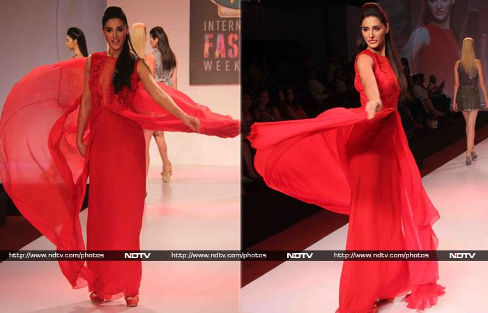 A bevy of Bollywood actresses walked the ramp at the Signature International Fashion Weekend held in Mumbai on Saturday (November 16, 2013). <br><br>

<i>Madras Cafe</i> actress Nargis Fakhri was a vision in a red gown when she sashayed down the runway for designer Nachiket Barve.