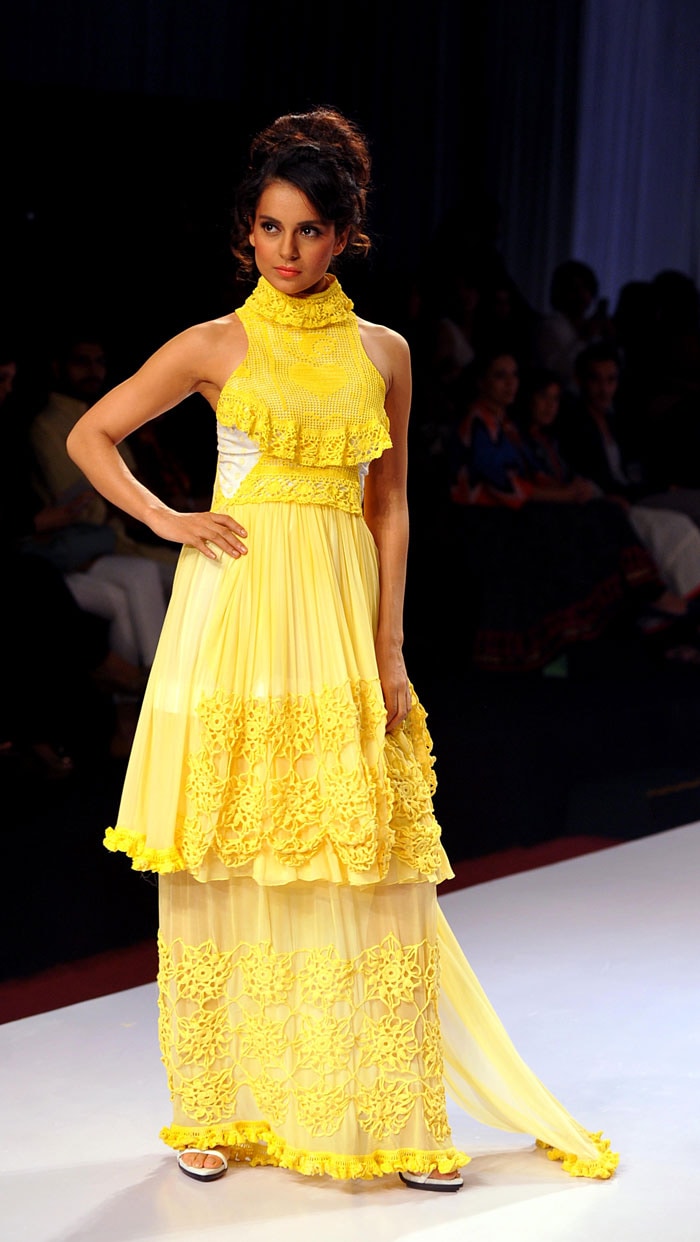 Bollywood actress Kangana Ranaut walked the ramp for designer Bora Aksu at the International Fashion Week End in Mumbai on Sunday, November 17.<br><br>

The actress, who was last seen in <i>Krrish 3</i> and <i>Rajjo</i>, looked pretty in a yellow outfit.