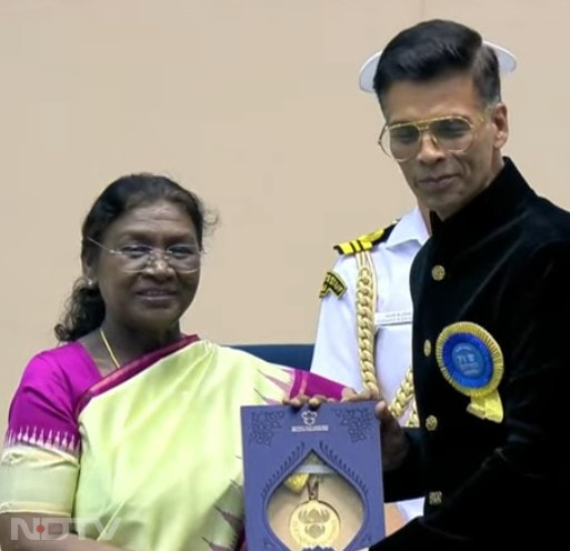 Karan Johar accepts the award for Best Popular Film Providing Wholesome Entertainment for his film Rocky Aur Rani Kii Prem Kahaani at the 71st National Film Awards.