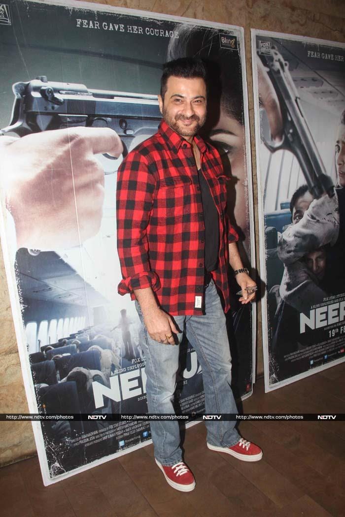 Sonam's uncle Sanjay Kapoor looked nice in a checked shirt and denims.