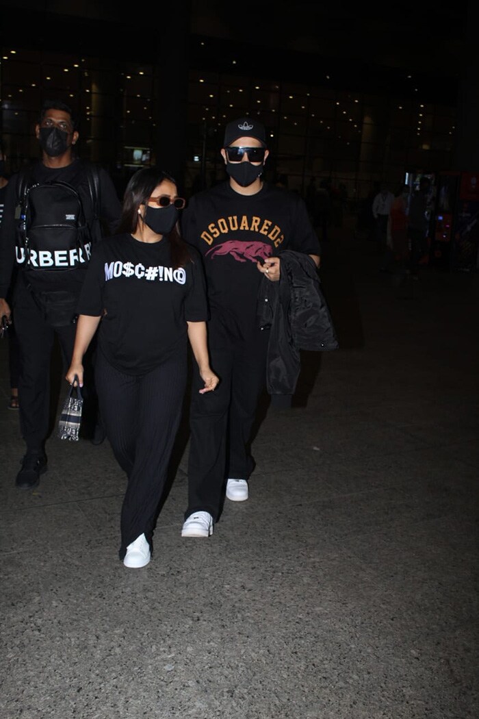 Neha Kakkar along with her husband Rohanpreet Singh were photographed at the Mumbai airport on Tuesday.