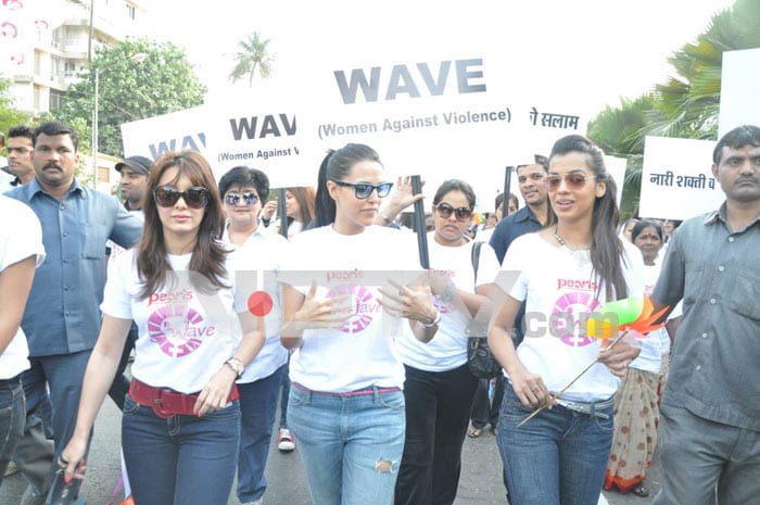 Bollywood stars Neha Dhupia, Minissha Lamba and Mugdha Godse protest against domestic violence on women