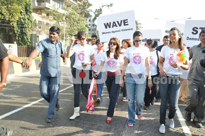 Bollywood stars Neha Dhupia, Minissha Lamba and Mugdha Godse protest against domestic violence on women.