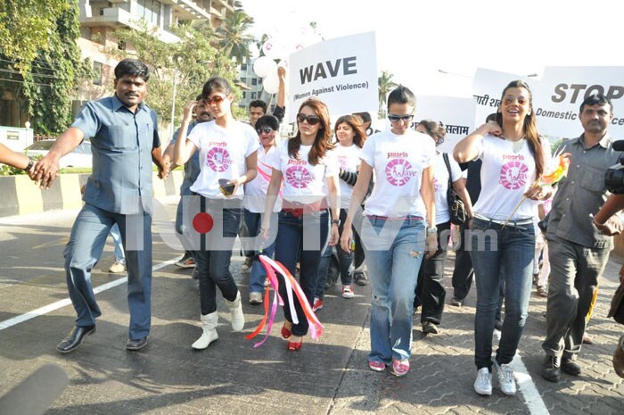 Bollywood stars Neha Dhupia, Minissha Lamba and Mugdha Godse protest against domestic violence on women.