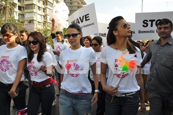 Bollywood stars Neha Dhupia, Minissha Lamba and Mugdha Godse protest against domestic violence on women.