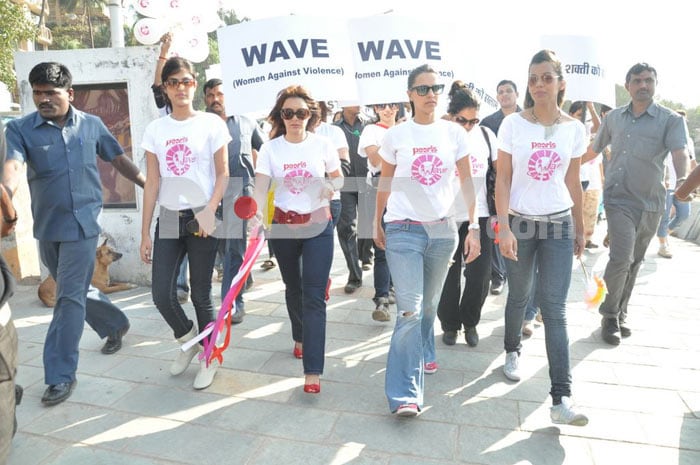 Bollywood stars Neha Dhupia, Minissha Lamba and Mugdha Godse protest against domestic violence on women.