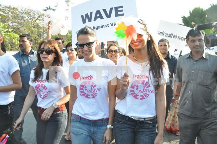 Bollywood stars Neha Dhupia, Minissha Lamba and Mugdha Godse protest against domestic violence on women.