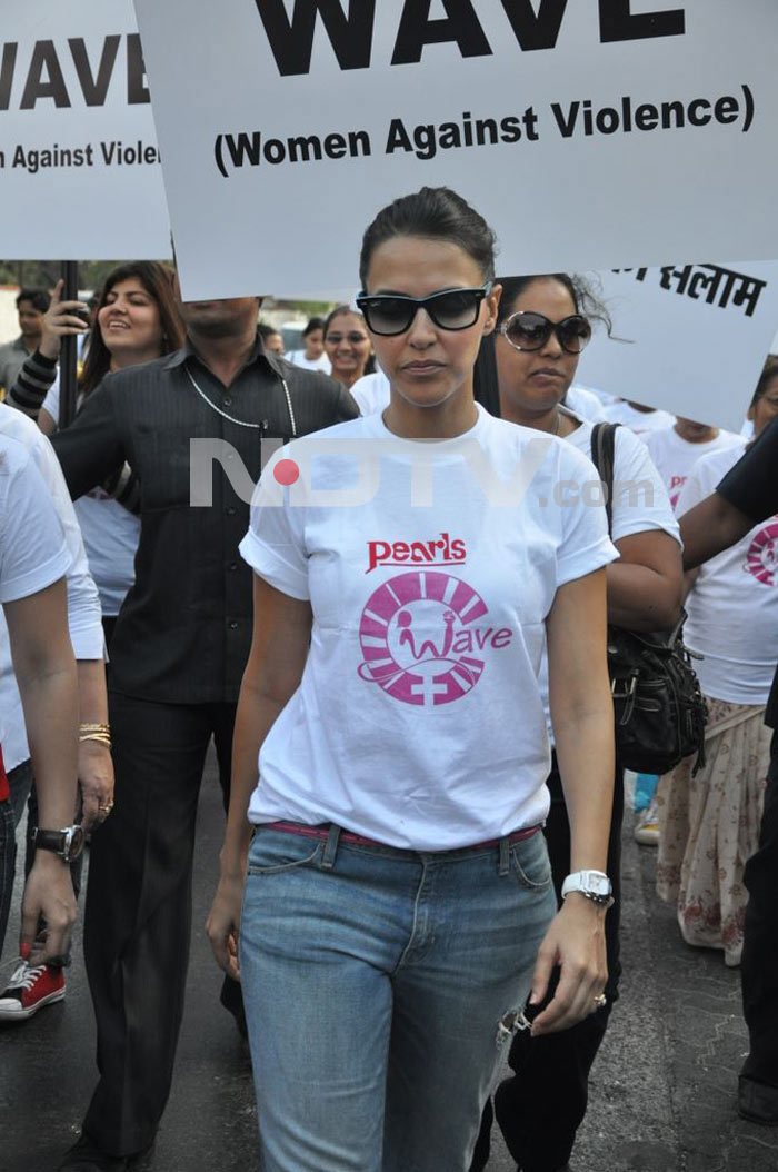 Bollywood actress Neha Dhupia protests against domestic violence on women.