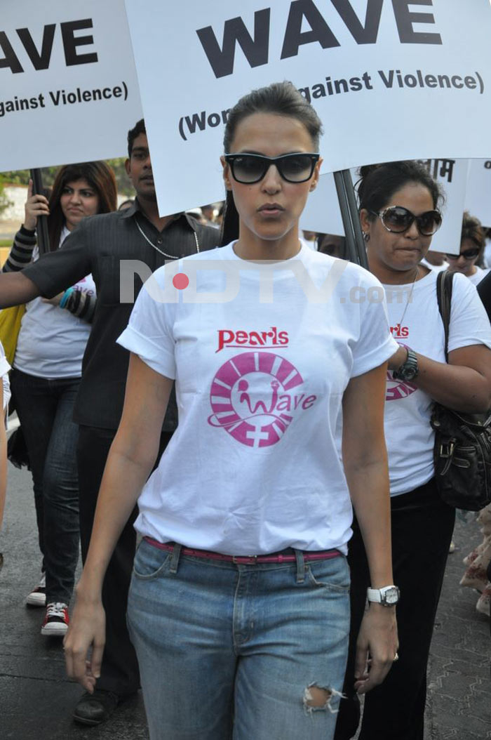 Bollywood actress Neha Dhupia protests against domestic violence on women.