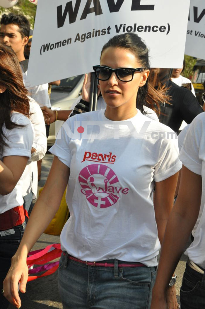 Bollywood actress Neha Dhupia protests against domestic violence on women.