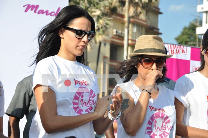 Bollywood actress Neha Dhupia protests against domestic violence on women.