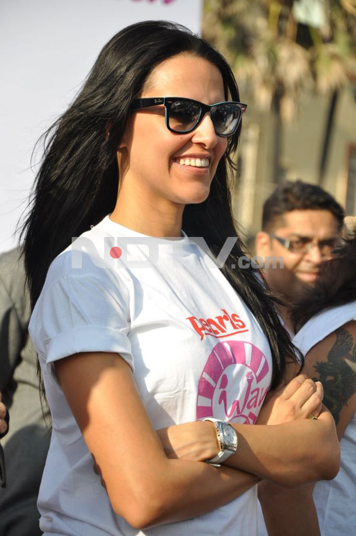Bollywood actress Neha Dhupia protests against domestic violence on women.