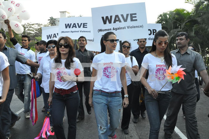 Bollywood stars Neha Dhupia, Minissha Lamba and Mugdha Godse protest against domestic violence on women.