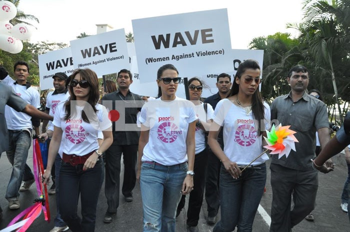 Bollywood stars Neha Dhupia, Minissha Lamba and Mugdha Godse protest against domestic violence on women.