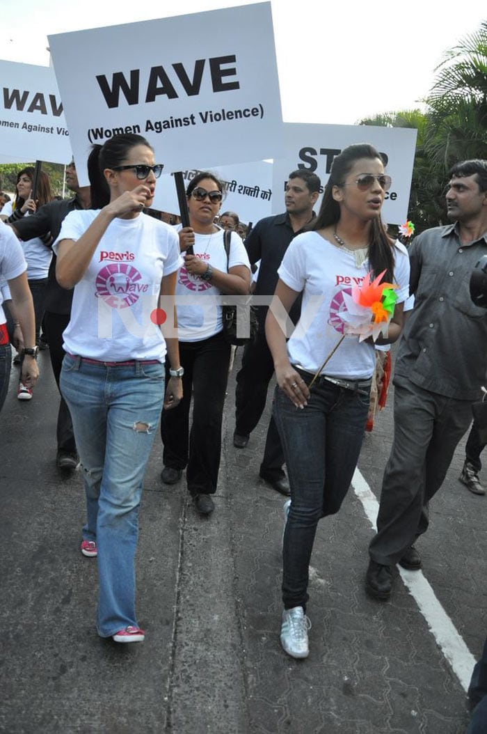 Bollywood stars Neha Dhupia, Minissha Lamba and Mugdha Godse protest against domestic violence on women.