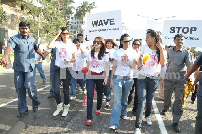 Bollywood stars Neha Dhupia, Minissha Lamba and Mugdha Godse protest against domestic violence on women.