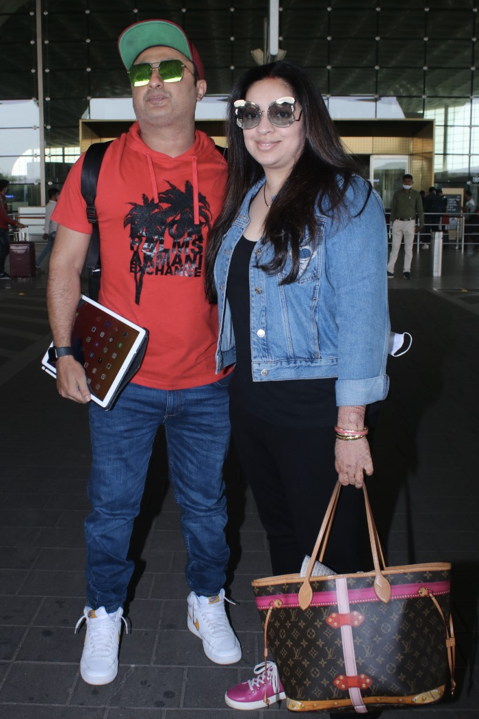 Film producer JP Dutta's daughter Nidhi Dutta was spotted at the Mumbai airport with her husband Binoy Gandhi on Sunday.