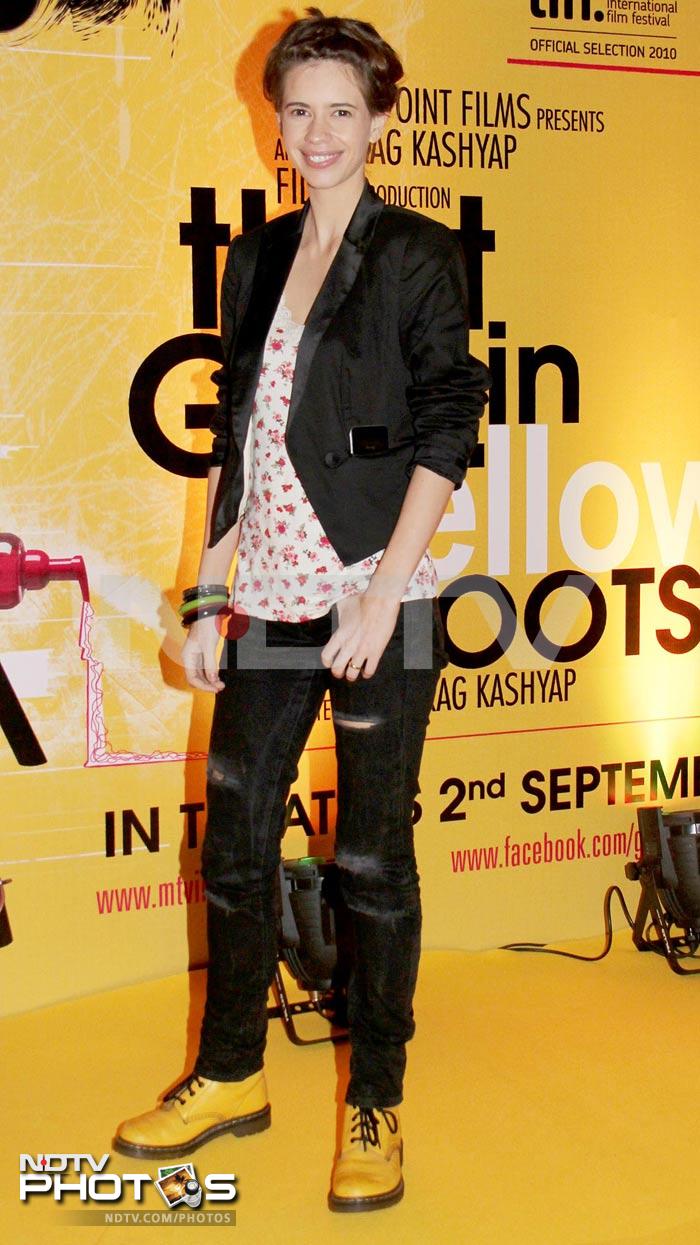 Kalki Koechlin, the rising fashionista, decided to stick with the yellow boots angle at the screening of <i>That Girl in the Yellow Boots</i>. <br>
Sporting an otherwise grunge look, Kalki set the tone for the evening with a cropped jacket.<br><br>
<embed allowScriptAccess="never" saveEmbedTags="true" quality="high" wmode="transparent" bgcolor="#ffffff" name="beta3" salign="tl" scale="autoscale" type="application/x-shockwave-flash" pluginspage="http://www.macromedia.com/go/getflashplayer" FlashVars="p=5470178" src="http://i.polldaddy.com/poll.swf" width="252" height="240"></embed>