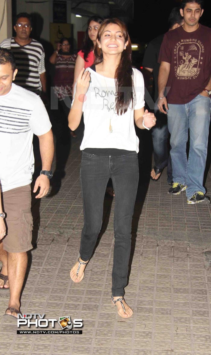 <b>Doll Face</b><br>
Anushka Sharma looked like the cutie she is in black skinny jeans and the classic tiny white tee, with a slip underneath. Cute-O-meter gives her a perfect 10!<br><embed allowScriptAccess="never" saveEmbedTags="true" quality="high" wmode="transparent" bgcolor="#ffffff" name="beta3" salign="tl" scale="autoscale" type="application/x-shockwave-flash" pluginspage="http://www.macromedia.com/go/getflashplayer" FlashVars="p=5199861" src="http://i.polldaddy.com/poll.swf" width="252" height="210"></embed>