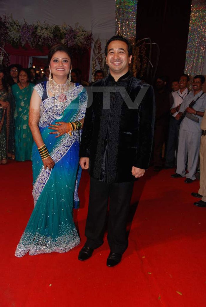 Say Cheese: The newlyweds, Nitish Rane and Rutuja Shinde, are all smiles.