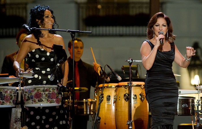 Gloria Estefan performs alongside Sheila E (L) during a taping of "In Performance at the White House: Fiesta Latina," a concert hosted by US President Barack Obama celebrating Hispanic musical heritage, on the South Lawn of the White House in Washington, DC. (Photo: AFP)