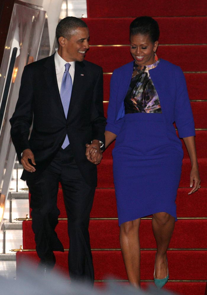 The First Lady arrived in the UK dripping elegant style in royal blue outfit by Preen.