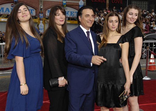 Andy Garcia, center, a cast member in Ocean's Thirteen, poses with his wife Marivi Lorido, second from left, and their daughters Alessandra, left, Daniella, second from right, and Dominik at the premiere of the film at Grauman's Chinese Theatre in Los Angeles.