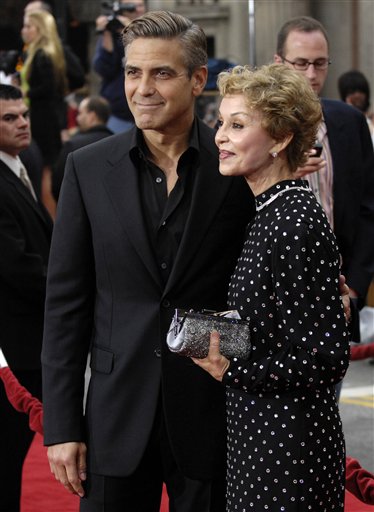 George Clooney, a cast member in the film Ocean's Thirteen, poses with his mother Nina at the premiere of the film at Grauman's Chinese Theatre in Los Angeles.