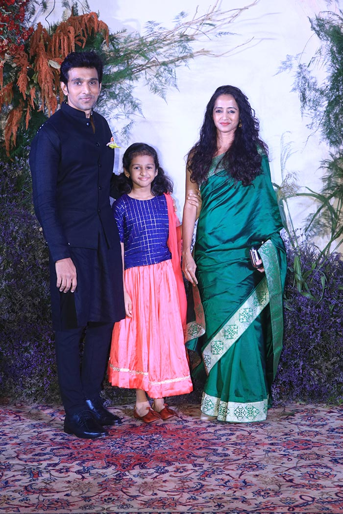 Pratik Gandhi attended the reception with his wife Bhamini Oza and their daughter.