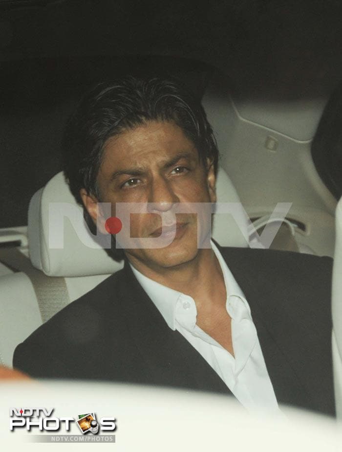 Shah Rukh Khan in his car.