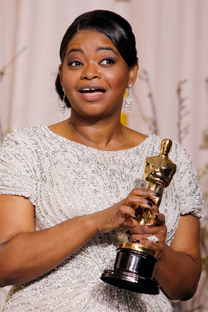 ?Thank you Academy for putting me with the hottest guy in the room? ? Octavia Spencer is thrilled to receive her Best Supporting Actress award from Christian Bale