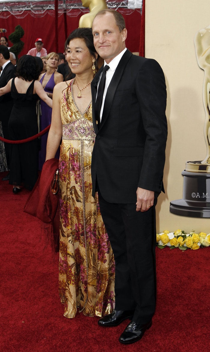 Woody Harrelson and Laura Louie arrive during the 82nd Academy Awards on Sunday, March 7, 2010, in the Hollywood section of Los Angeles. (Photo: AP)