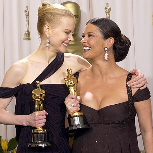 Nicole Kidman (left) who got the Best Actress award for <I>The Hours</i> and Catherine Zeta Jones who got the Best Supporting Actress award for <I>Chicago</i> posed together at the 2003 Oscar ceremony.