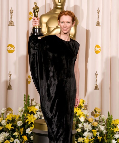 Tilda Swinton with her award for Best Supporting Actress for <I>Michael Clayton</i> in 2008. Swinton isn't a nominee this year though she played a supporting role in two films <I>The Curious Case of Benjamin Button</i> and <I>Burn After Reading</i>.